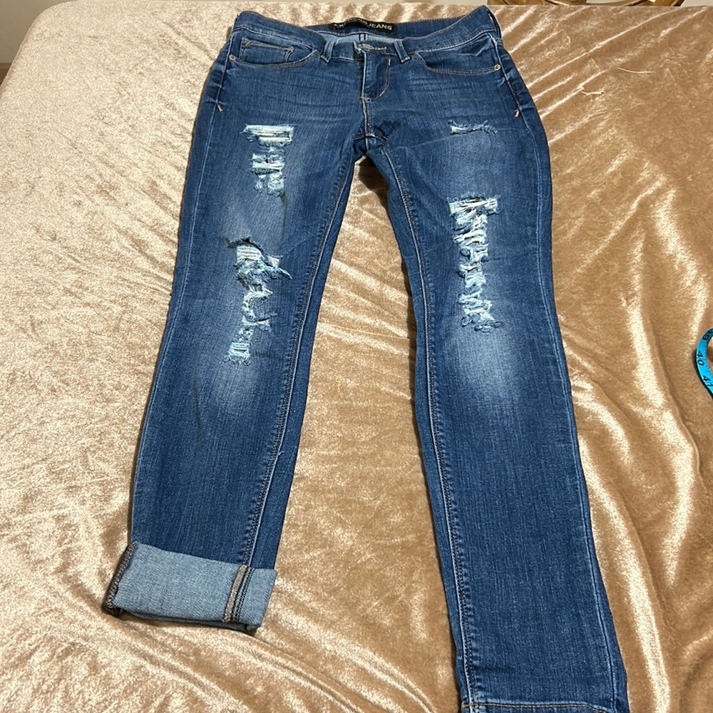 Expess Jeans leggin mid rise. stretch destroyed jeans